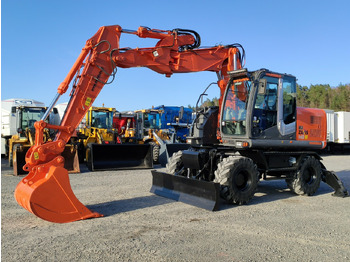 Excavator pe roţi HITACHI