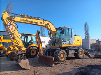 Excavator pe roţi NEW HOLLAND