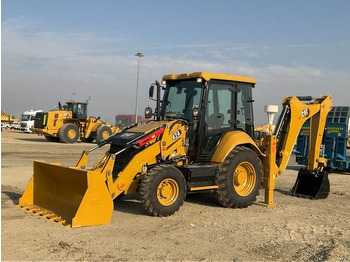 Buldoexcavator CATERPILLAR