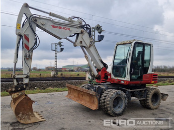 Excavator pe roţi TAKEUCHI