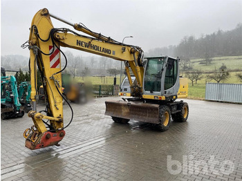 Excavator pe roţi NEW HOLLAND